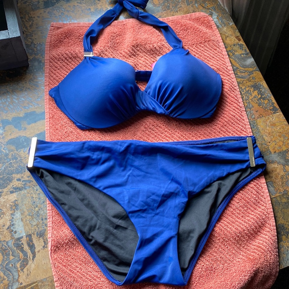 Victoria’s Secret 2 piece bikini   Navy blue with gold metal clips.  Gently used